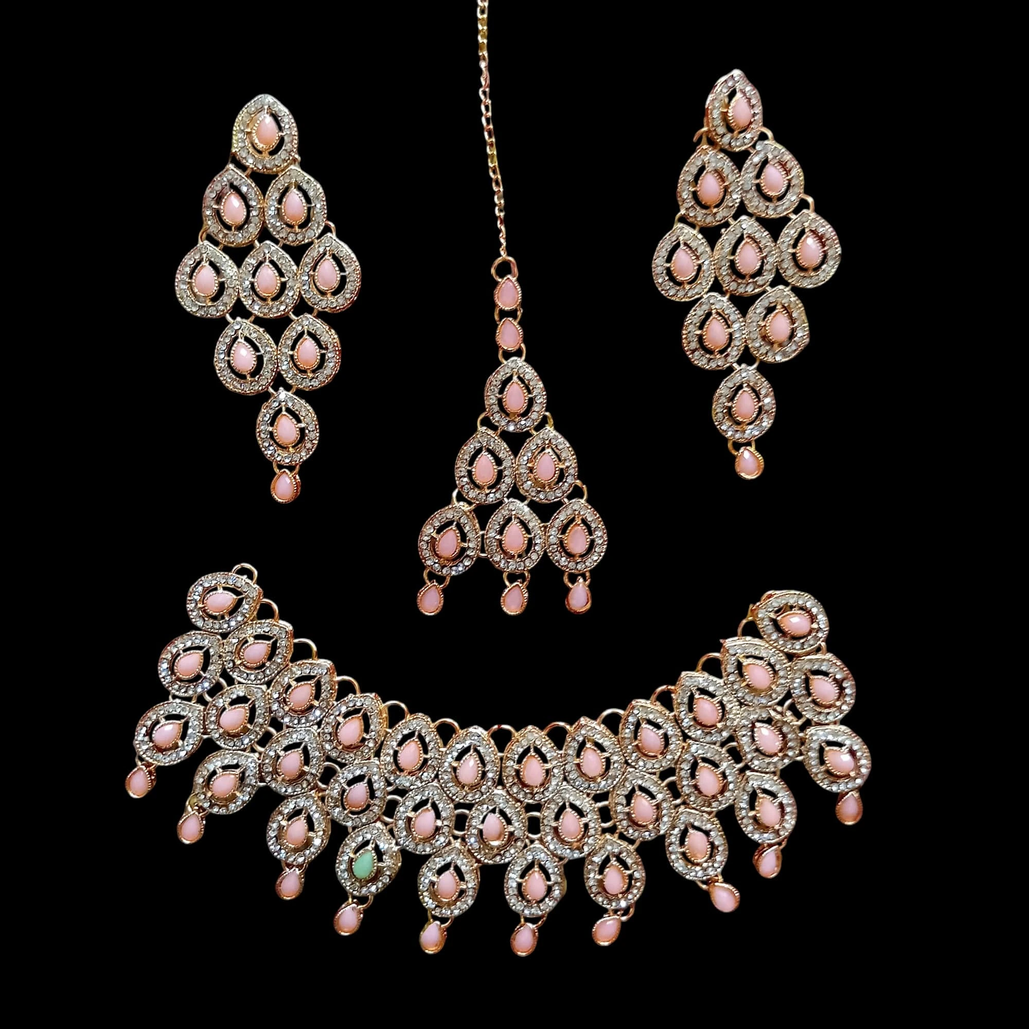 Buy Pink colour jewellery set with necklace , earrings and tikka at best price in pakistan